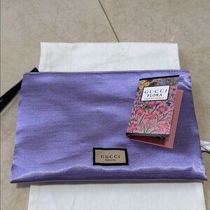 Gucci Flora Cosmetics Bag with perfume sample .